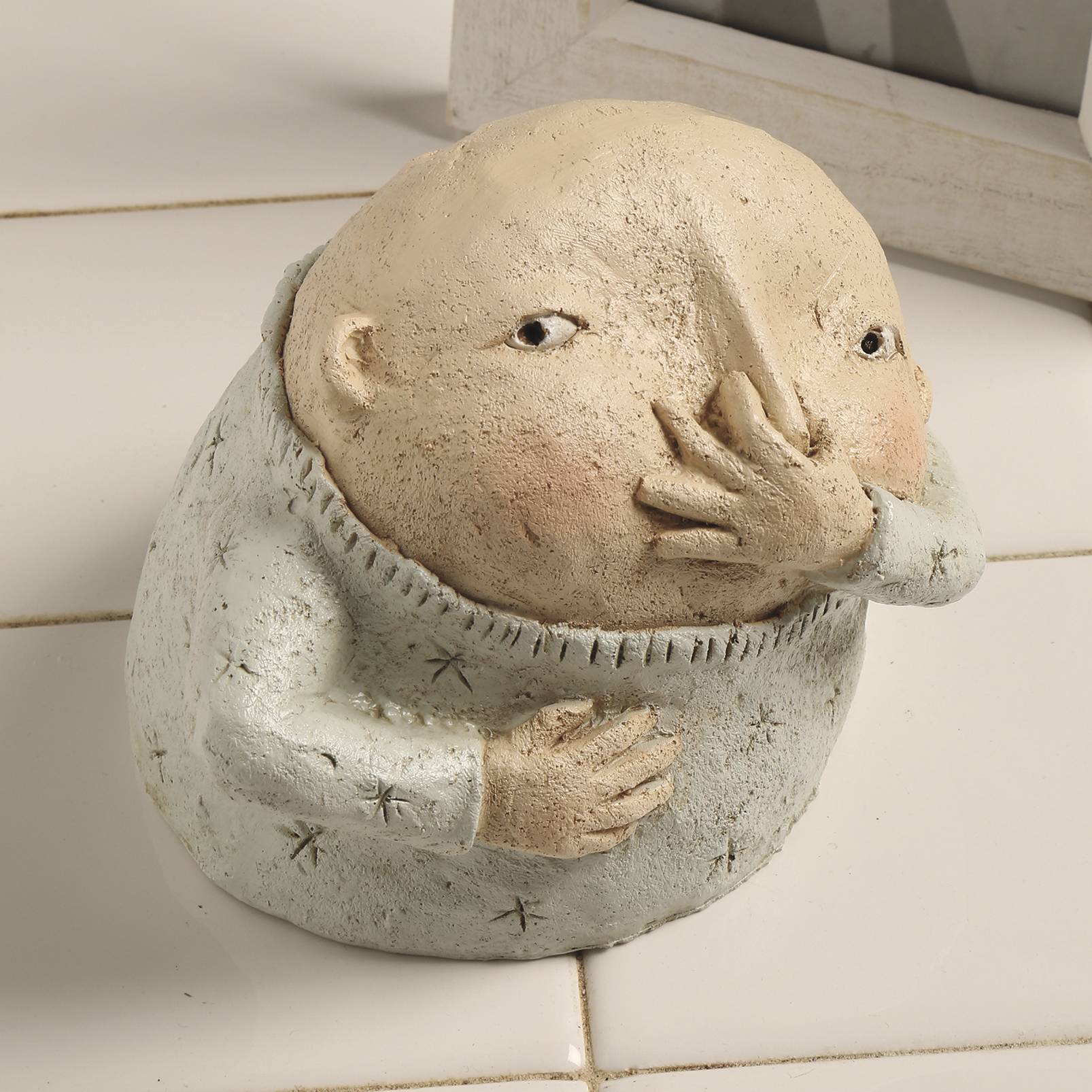 Boy Holding Nose Sculpture - Signals Catalog