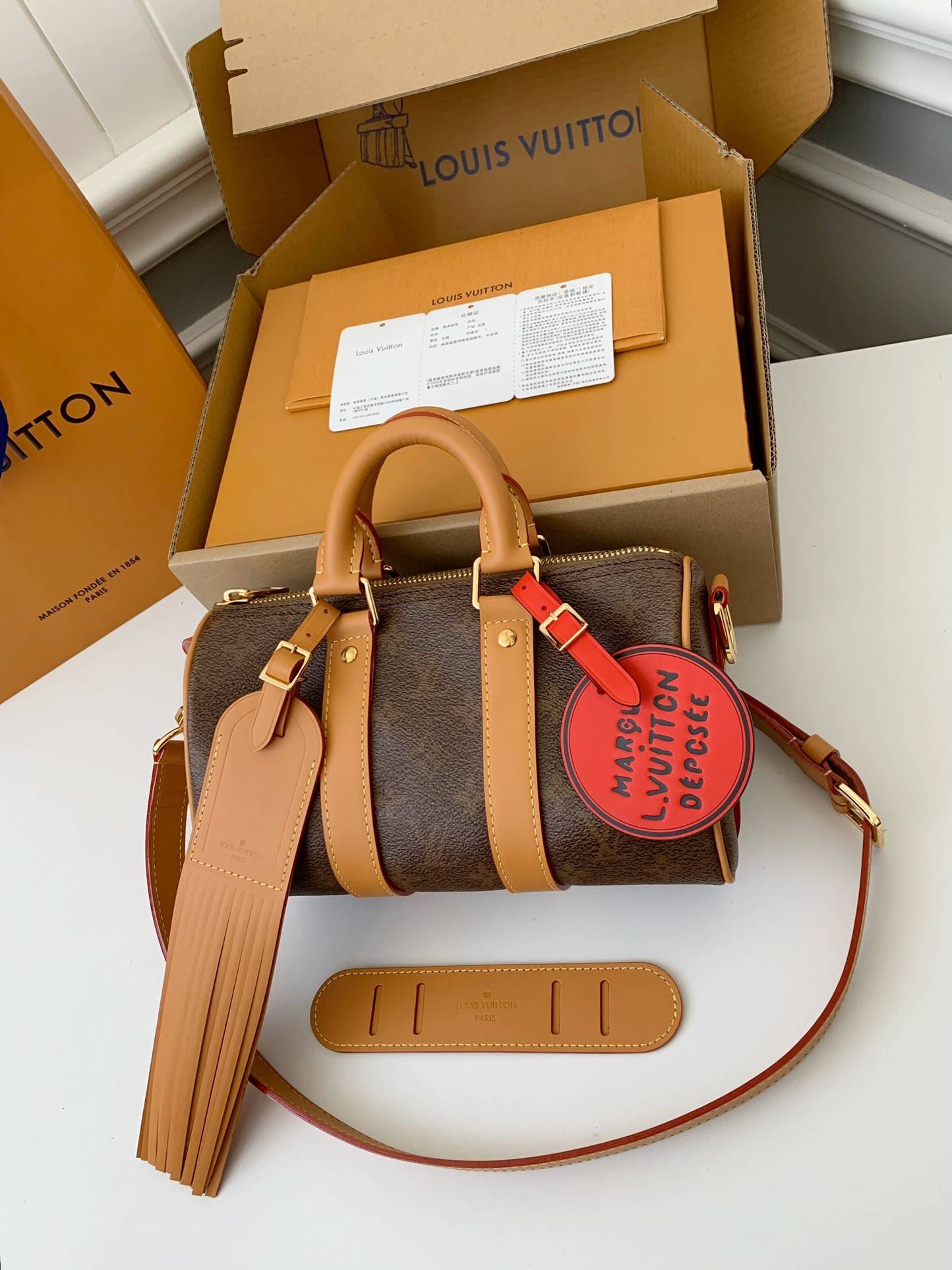 L*V The New Keepall Bandouli ère 25 handbag M11542 Size:25*15*11cm