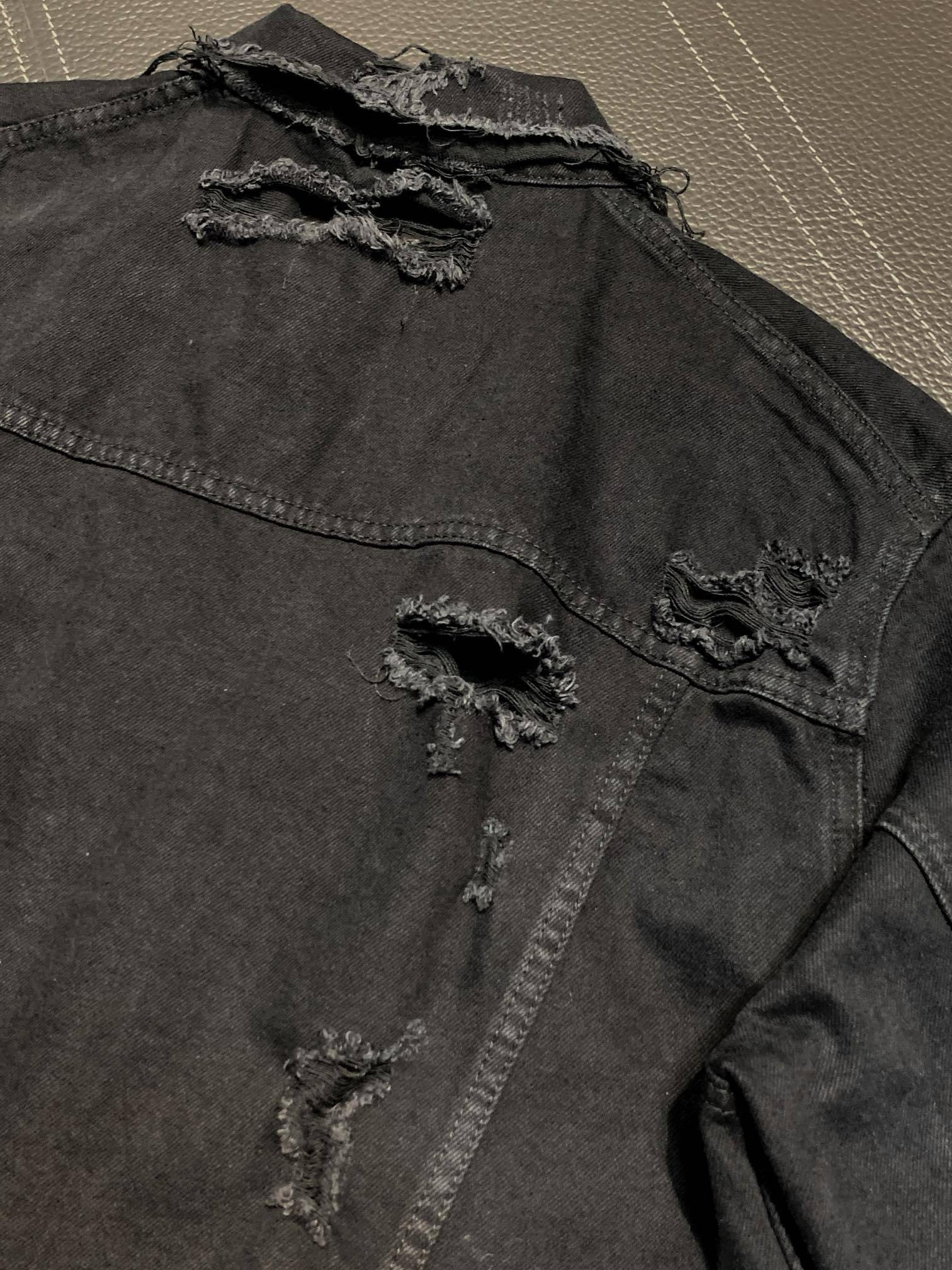 Balenciaga ripped denim jacket