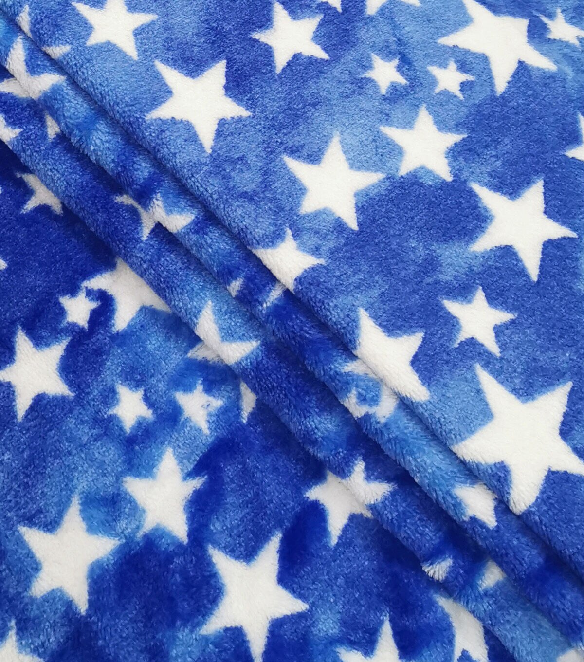 Sew Lush Stars on Blue Tie Dye Fleece Fabric