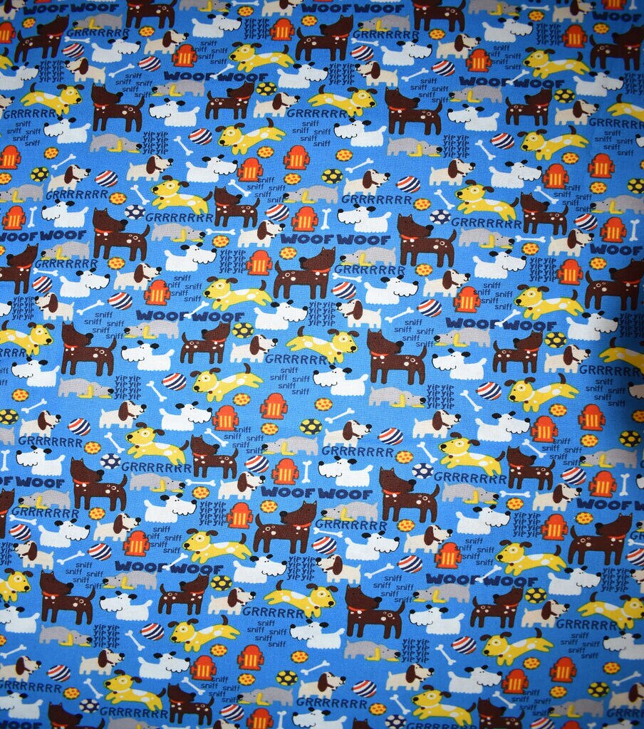 Dogs On Blue Novelty Cotton Fabric