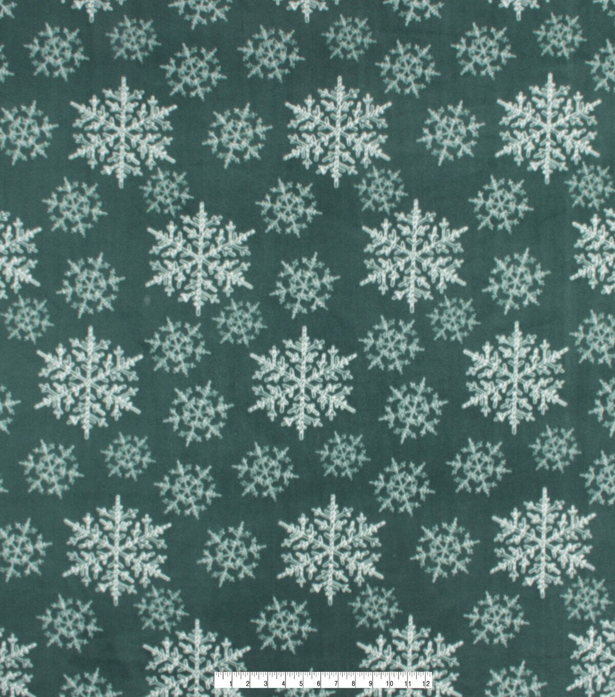 White Snowflakes on Green Anti Pill Fleece Fabric