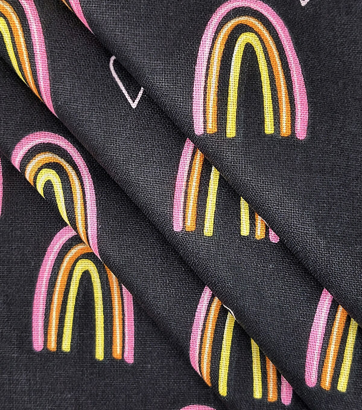 Rainbows On Black Novelty Cotton Fabric