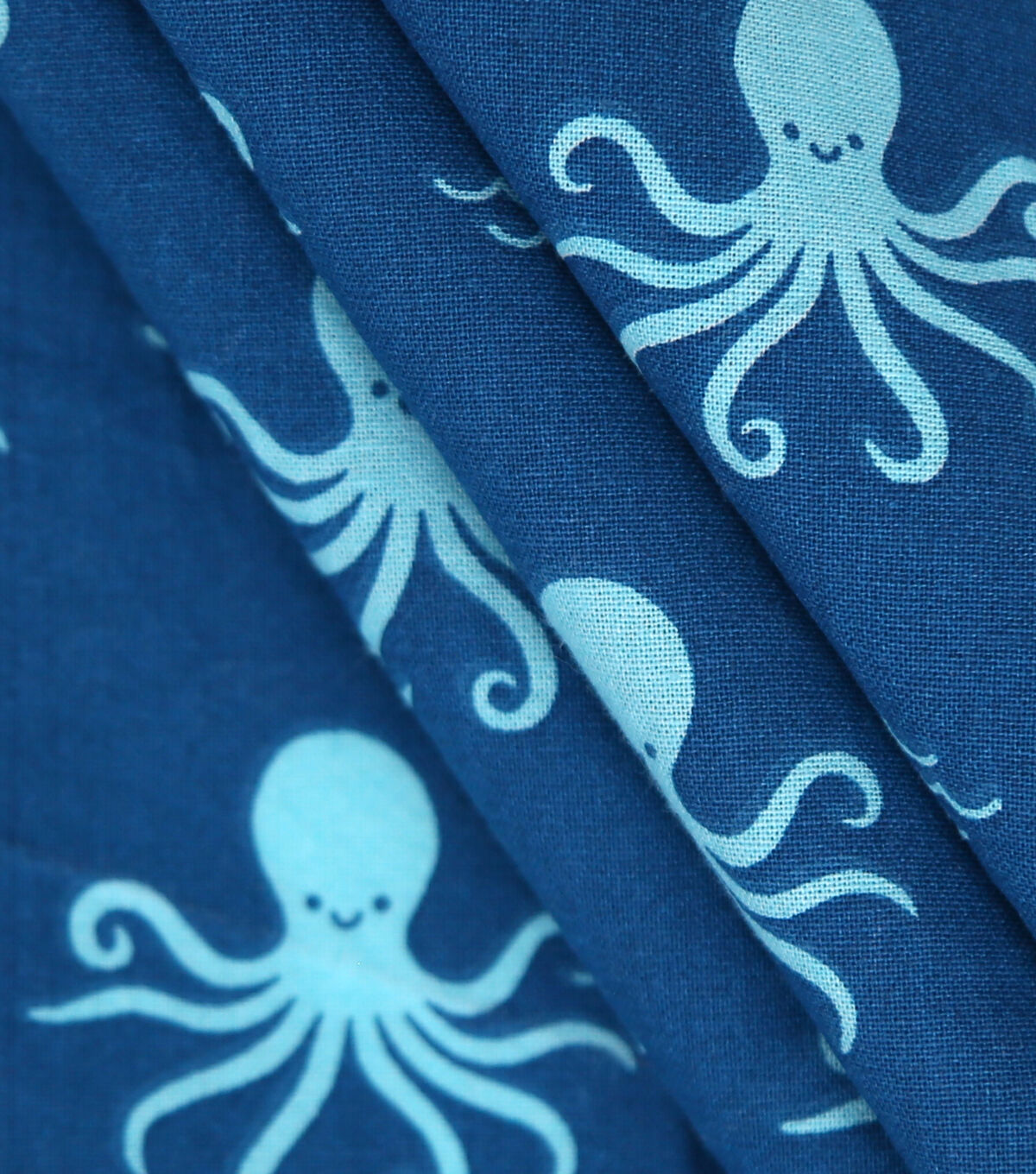 Blue Swimming Octopus Novelty Cotton Fabric by POP!