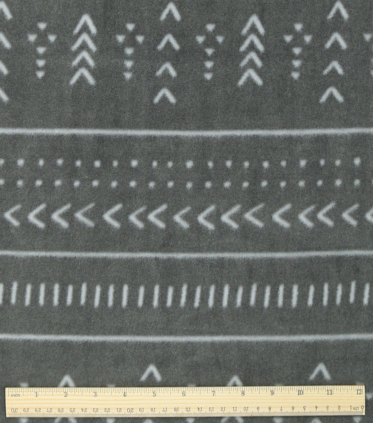 Directional Geometrics on Gray Anti Pill Fleece Fabric