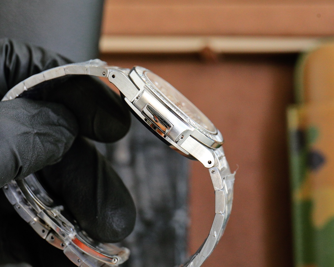 Patek Philippe Nautilus Ladies White Gold Diamond Bezel 7118