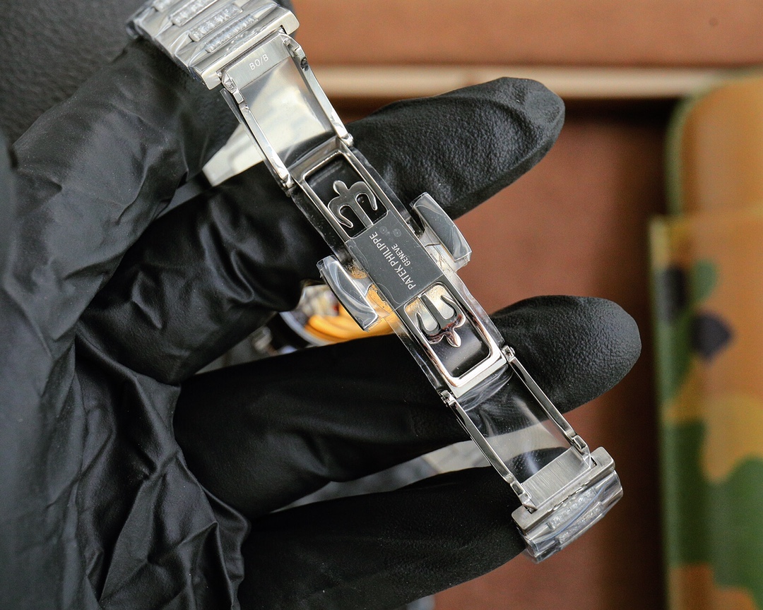 Patek Philippe Nautilus Ladies White Gold Diamond Bezel 7118