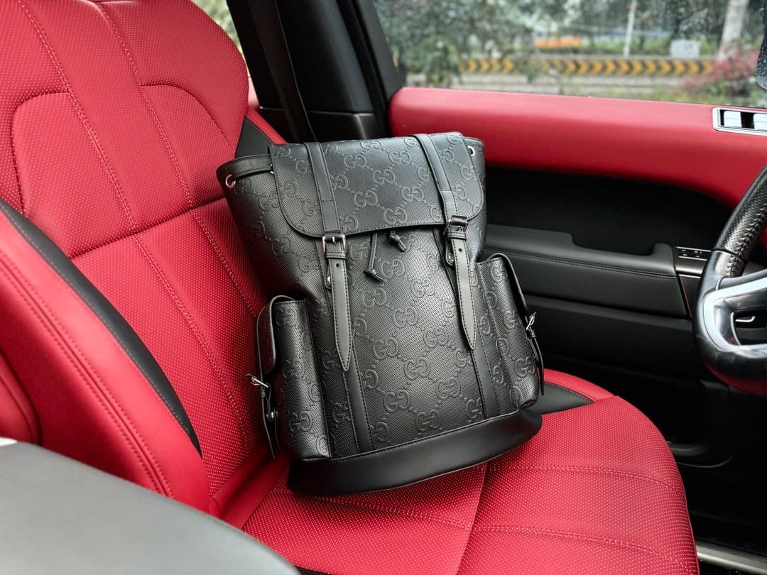 Gucci GG Leather Logo Embossed Backpack - FrasersFashion