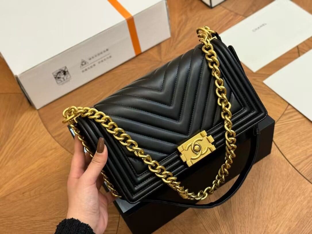 CHANEL Calfskin Chevron Quilted Medium Boy Flap Black - FrasersFashion