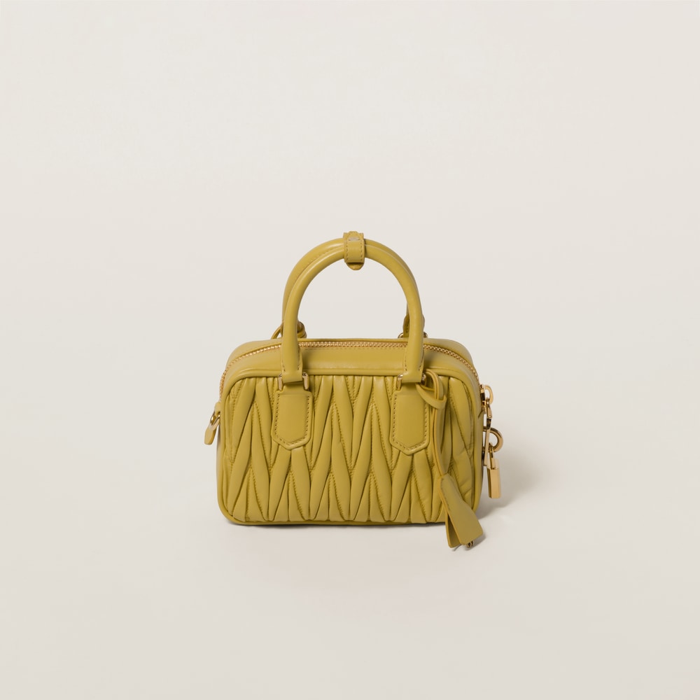 Matelassé nappa leather top-handle bag 19cm Pineapple - FrasersFashion