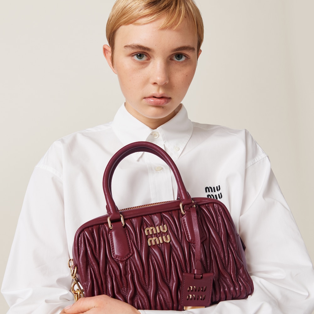 Matelassé nappa leather top-handle bag 24cm Amaranth Red/Maize Yellow - FrasersFashion