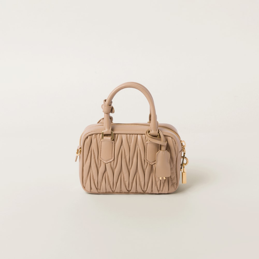 Matelassé nappa leather top-handle bag 19cm Sand Beige - FrasersFashion