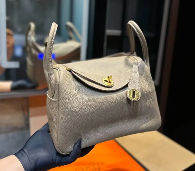 HERMÈS ETOUPE CLEMENCE LINDY 26 GOLD HARDWARE - FrasersFashion