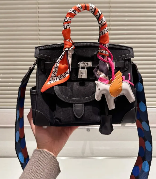 HERMÈS BIRKIN CARGO 25 BLACK SWIFT AND TOILE CANVAS PALLADIUM HARDWARE - FrasersFashion