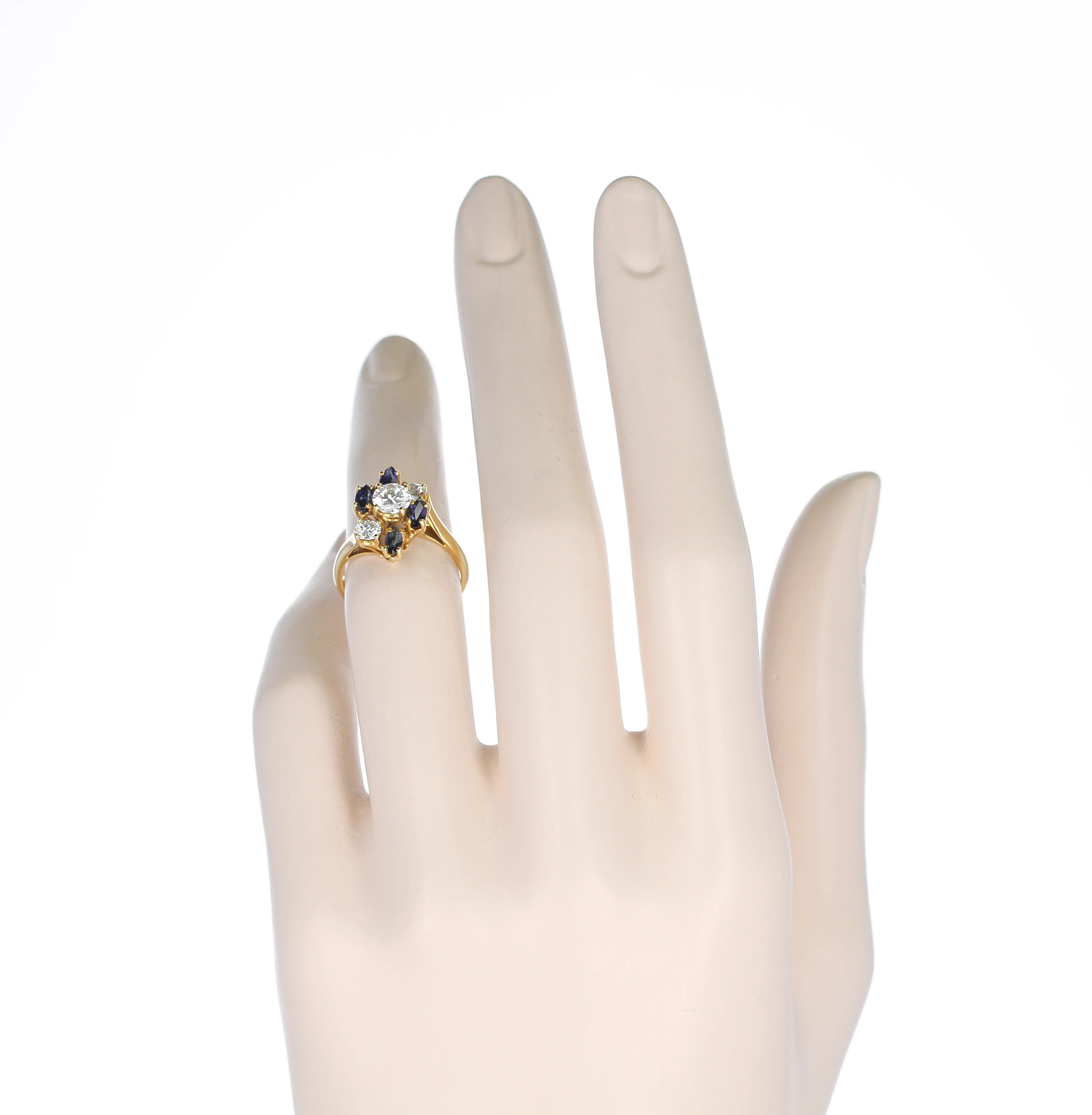 Chaumet, Paris Marquise Sapphire and Round Diamond Ring, 18 Karat Yellow Gold