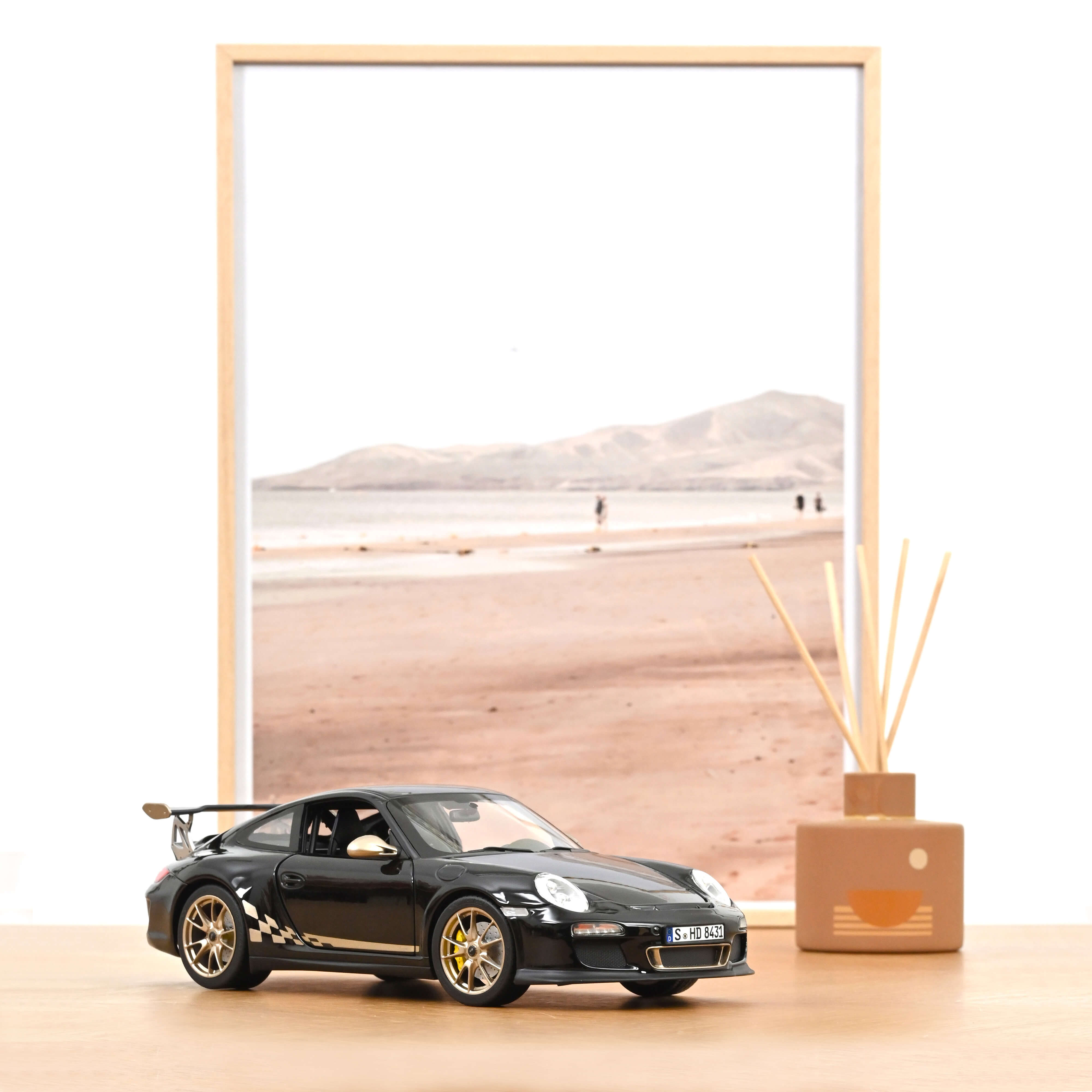 Porsche 911 GT3 RS 2009 Black und white gold metallic 1:18