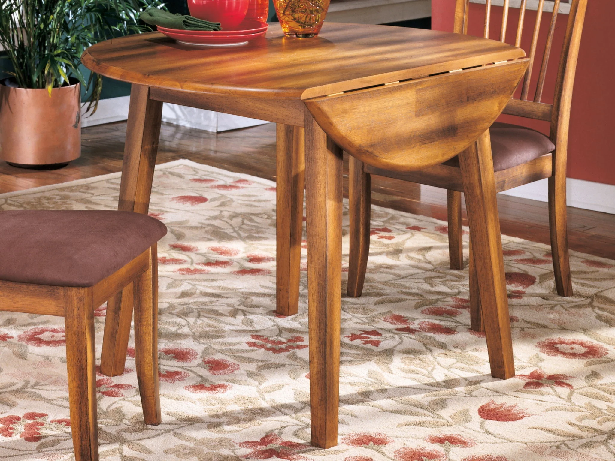 Berringer - Round DRM Drop Leaf Table - Rustic Brown
