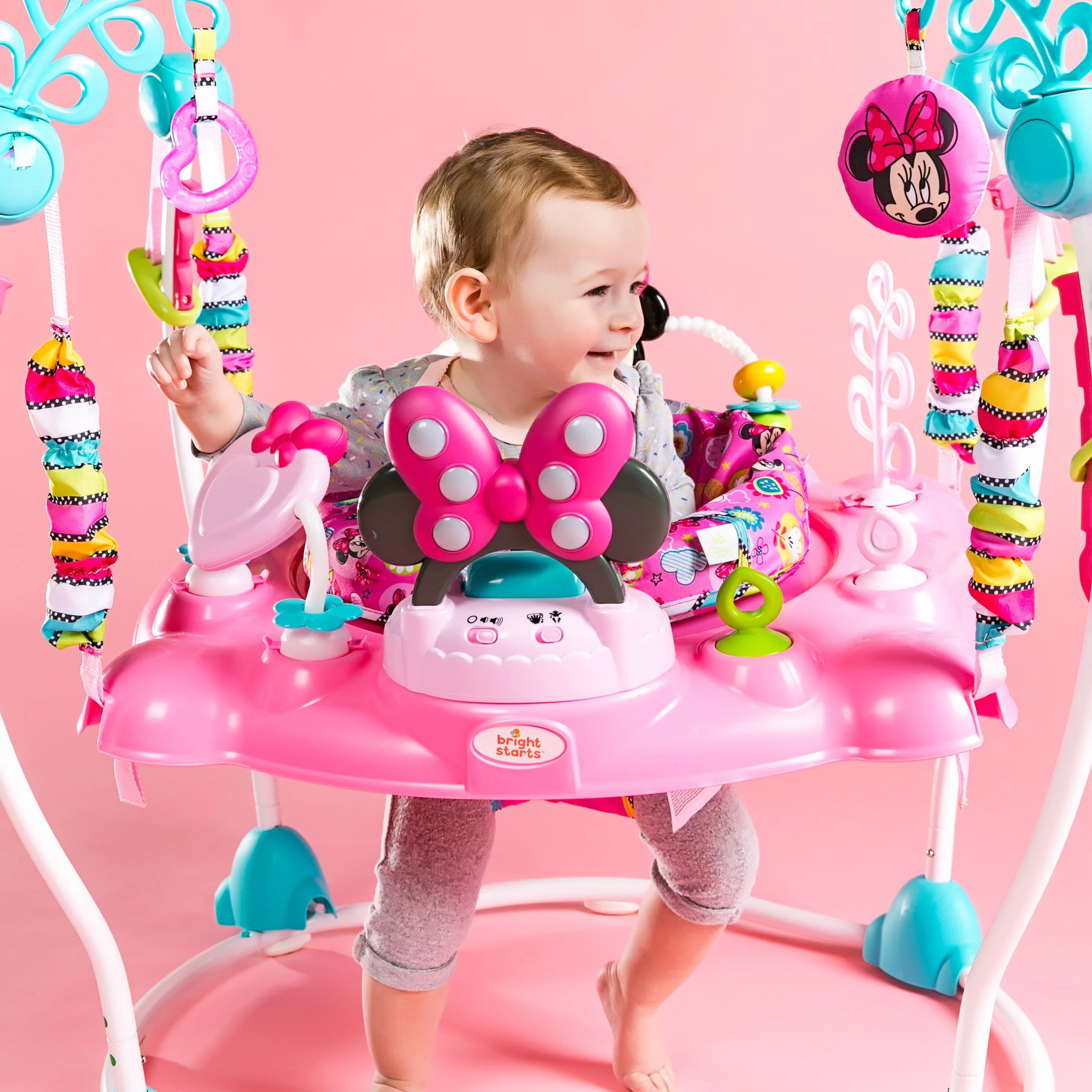 Andador de actividad Disney Baby Minnie Mouse Bright Start con luces y melodías. para niños a partir de 6 meses